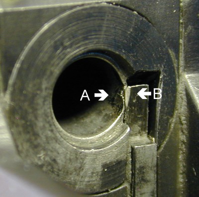 Fig 1 &amp;amp; 2 A: Chamber wall nick. B: Extractor wear.