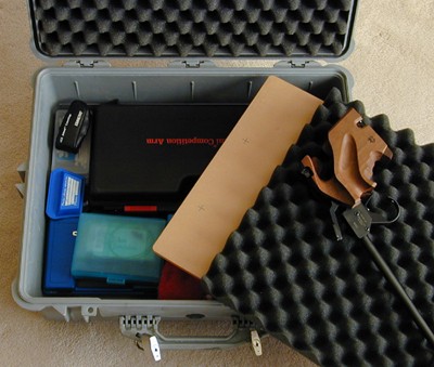 Two-gun set up, Plexiglas (brown) is used to divide the case, upper and lower sections. Will accommodate a Morini free, air pistols and range gear.